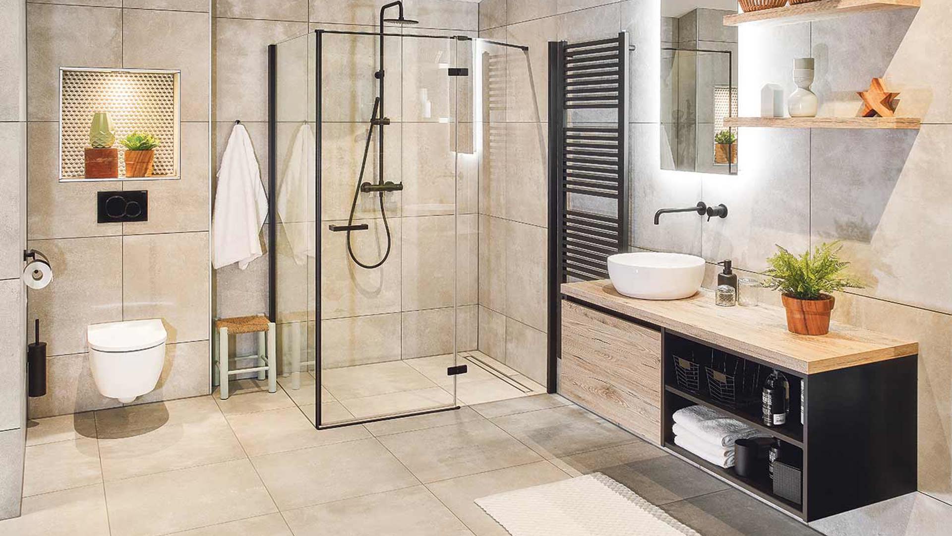 Moderne badkamer met beton en zwarte staalramen en wit toilet